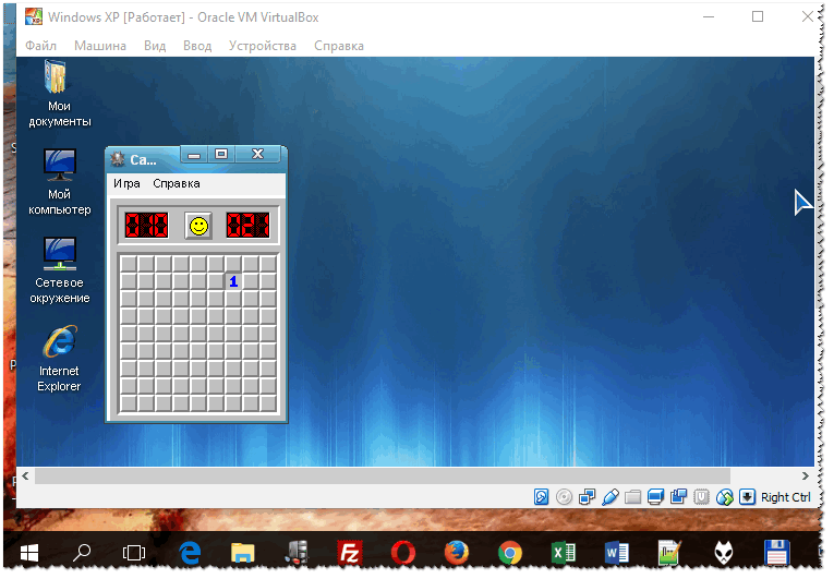 В Windows 10 открытой окно виртуальной машины с Windows XP